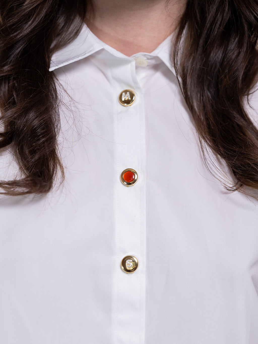 Three button covers on shirt