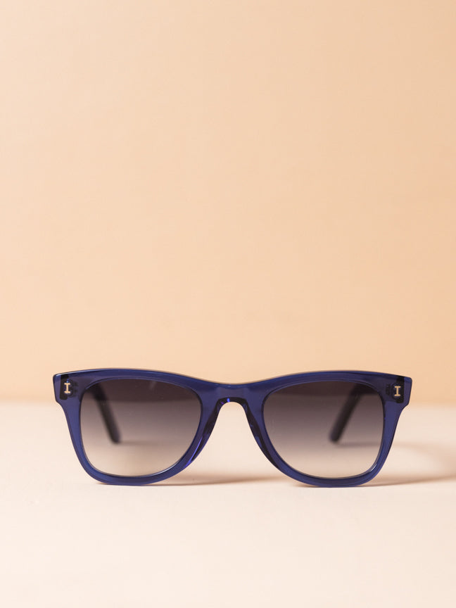 Illesteva sunglasses with rounded rectangular frames with blue frames and ombre lenses. Illesteva Austin in blue. Style Number:  ILLESTEVA-AUS5GRFG